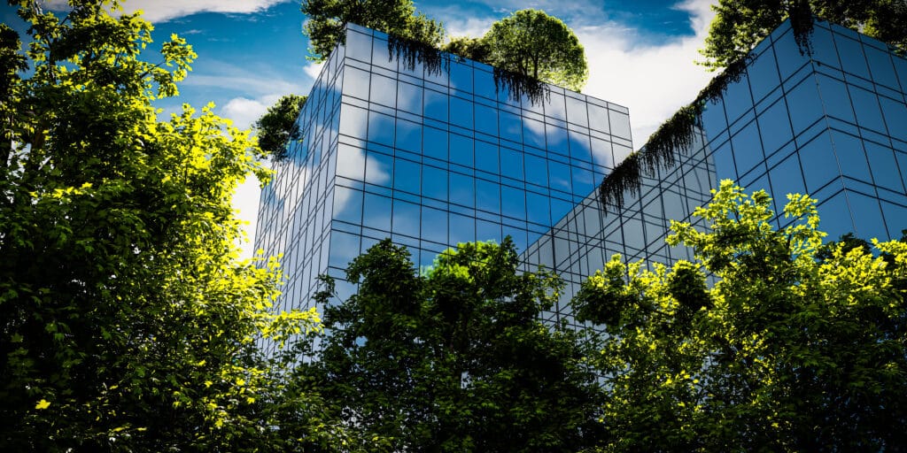 Moderne kantoorgebouwen met bomen op de daken en eromheen